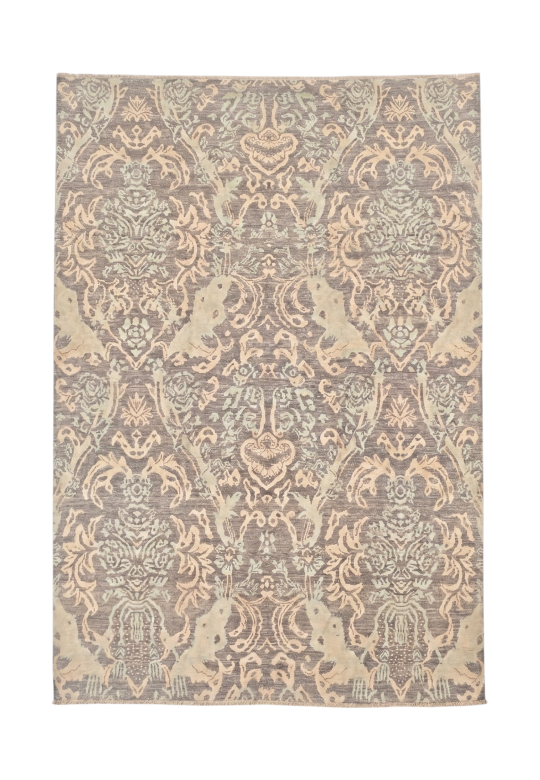 Decorative rug with intricate pattern on a plain background