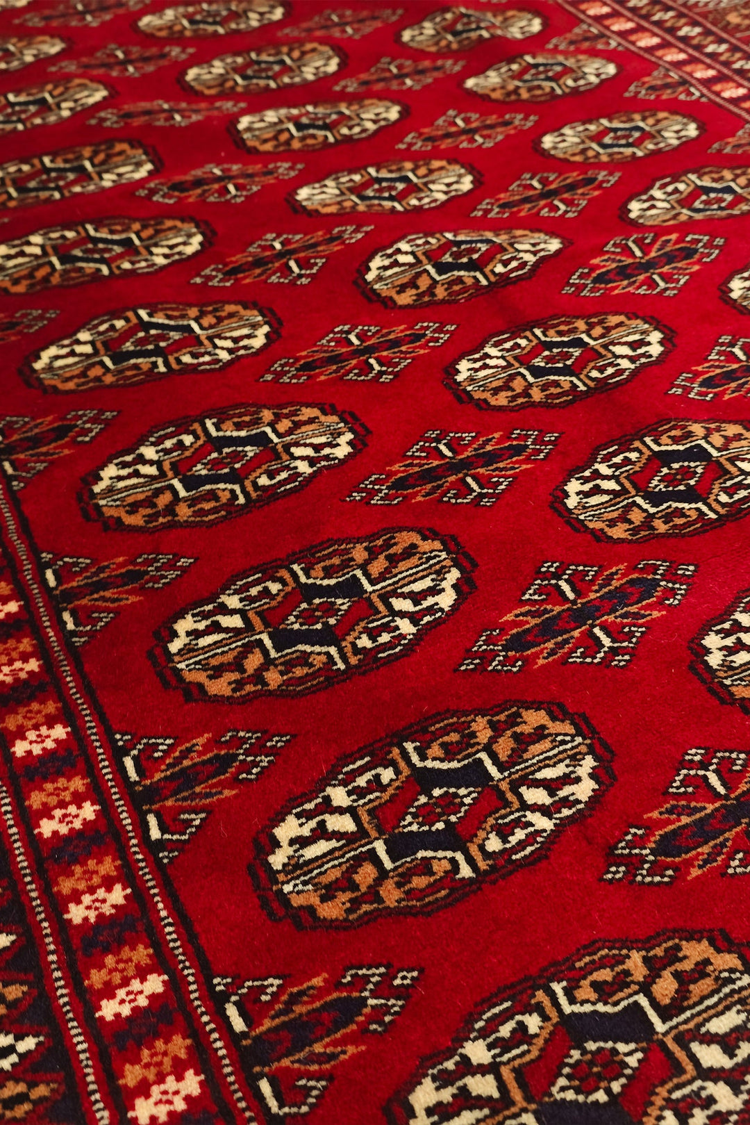 Bright Red Turkmen Gül Bokhara Rug, Hand-Knotted Pakistani Wool