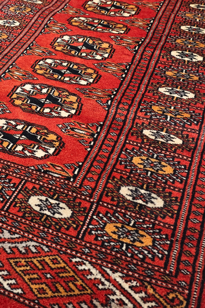 Red and Orange Turkmen Gül Bokhara, Hand-Knotted Wool Rug
