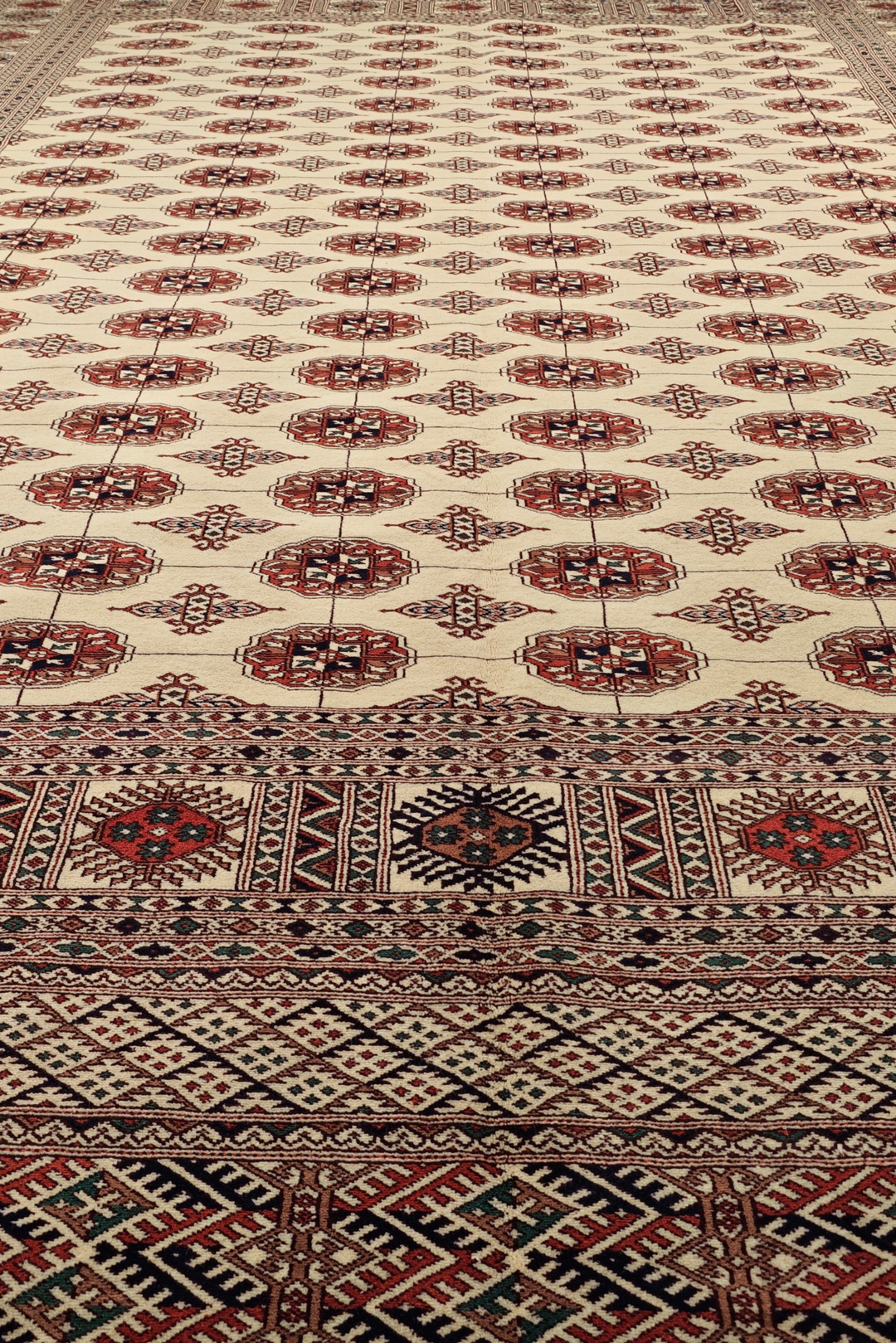 Ivory and Rust Turkmen Gül Bokhara, Hand-Knotted Wool Rug