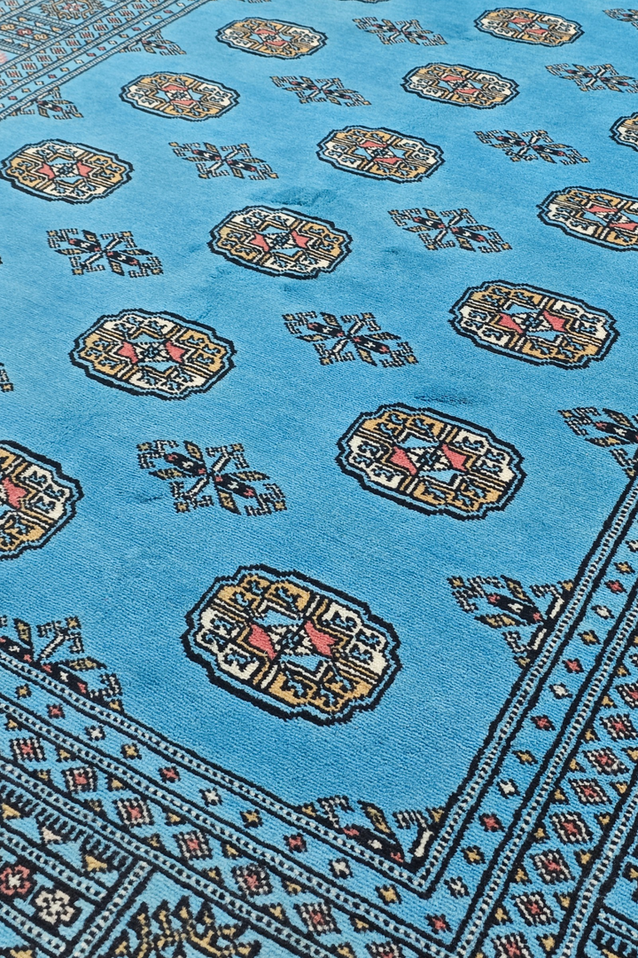 Turquoise and Ivory Turkmen Gül Bokhara, Hand-Knotted Wool Rug