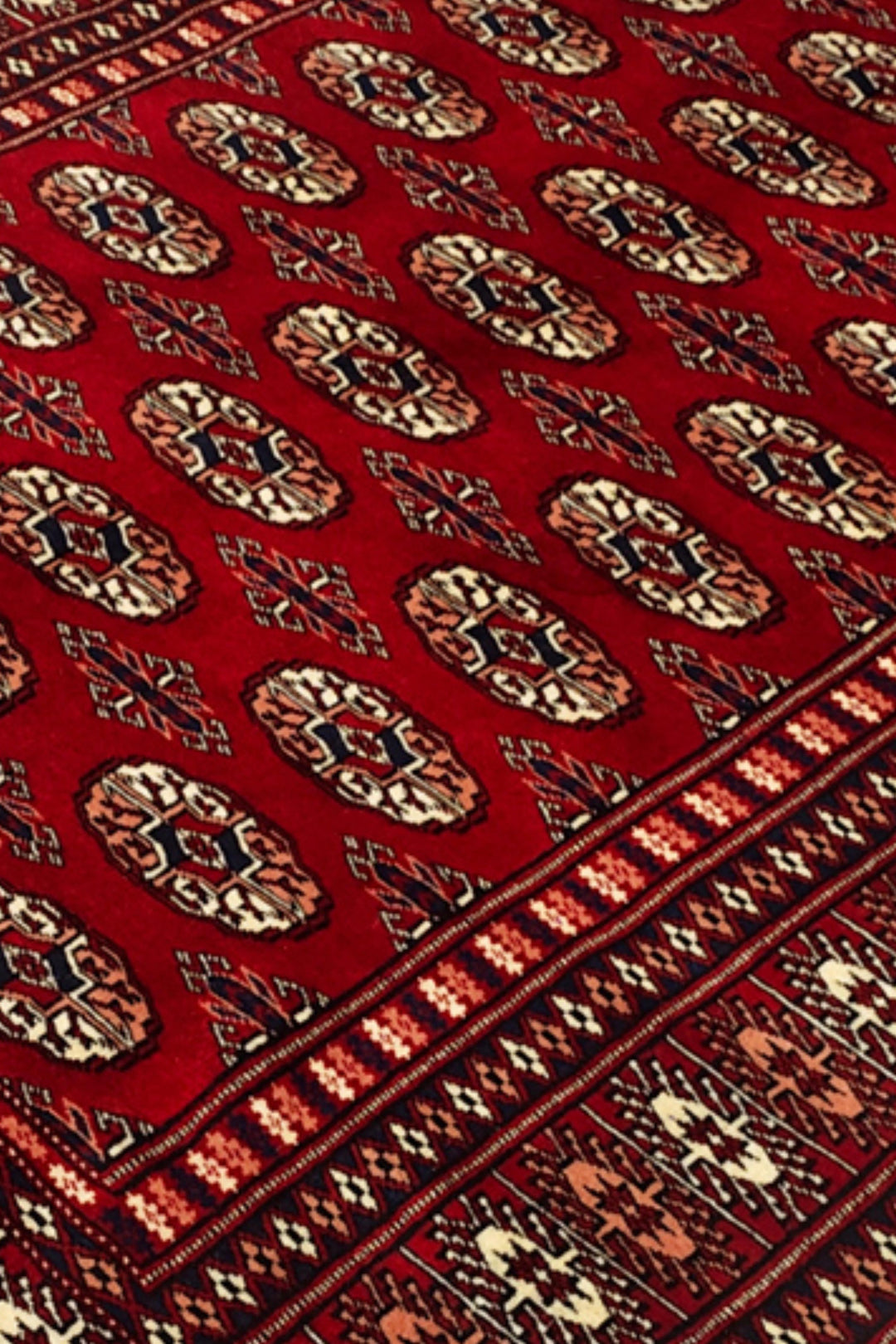 Oxblood Red Turkmen Gül Bokhara Rug, Hand-Knotted Pakistani Wool