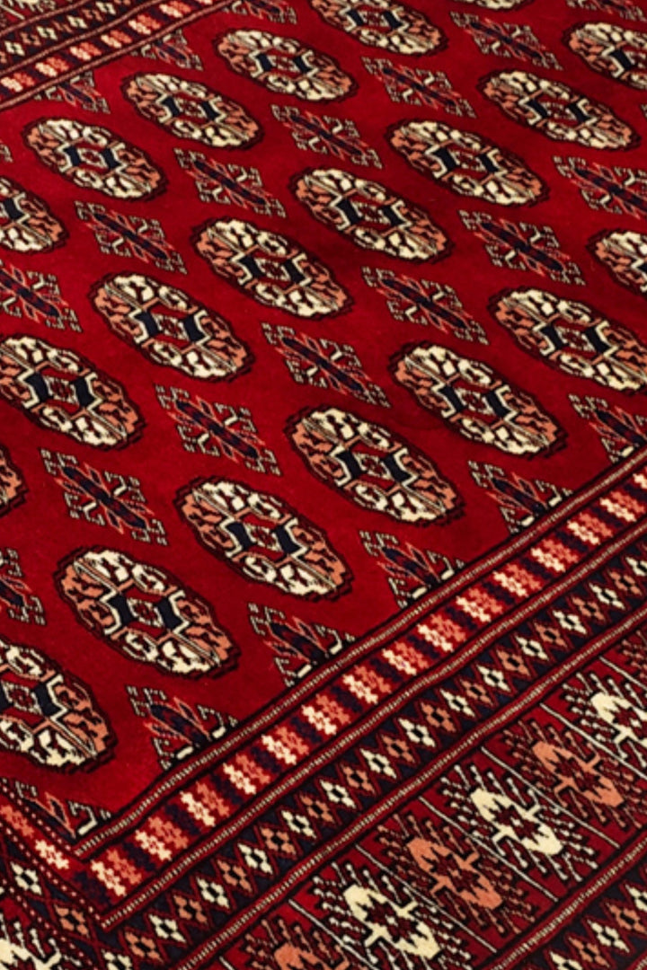 Oxblood Red Turkmen Gül Bokhara Rug, Hand-Knotted Pakistani Wool