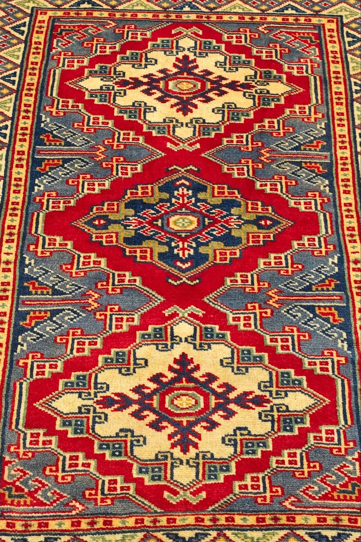 レッドのアフガン絨毯 カザック（幾何学柄） 手織りラグ 65×87cm（写真3）