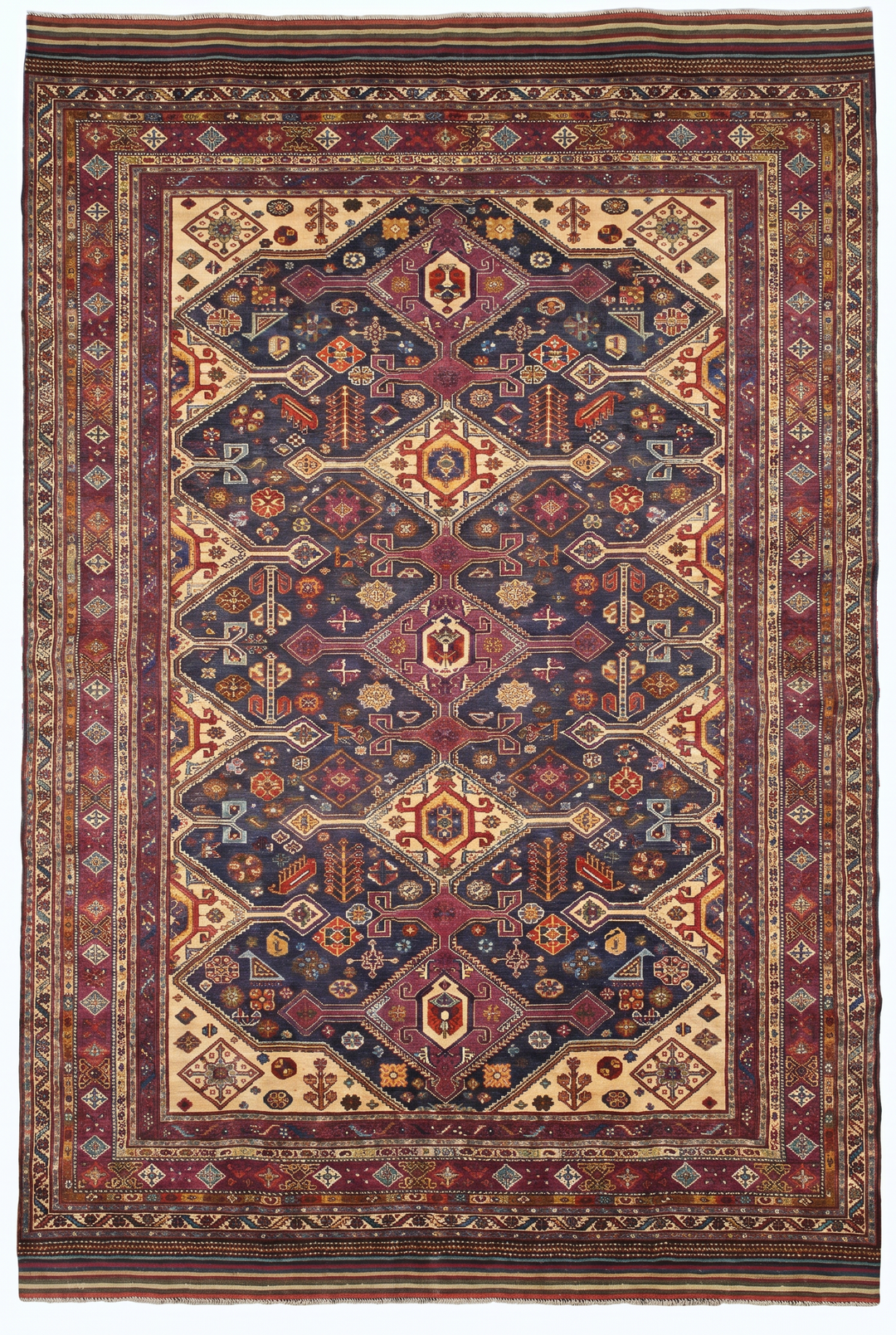 Decorative rug with intricate patterns on a white background