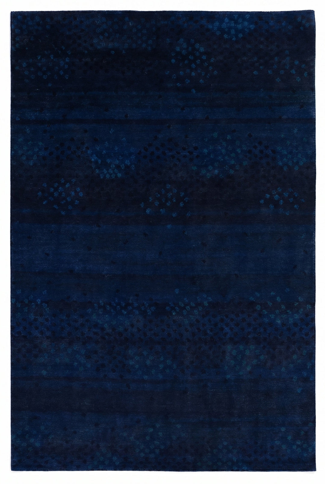 Navy blue textured rug on a white background