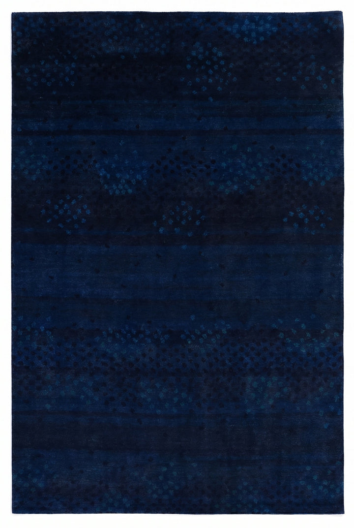 Navy blue textured rug on a white background
