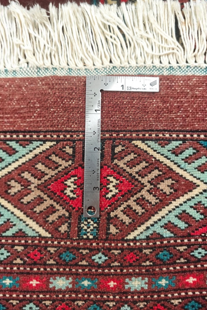 Oxblood and Blue Turkmen Gül Bokhara, Hand-Knotted Wool Rug