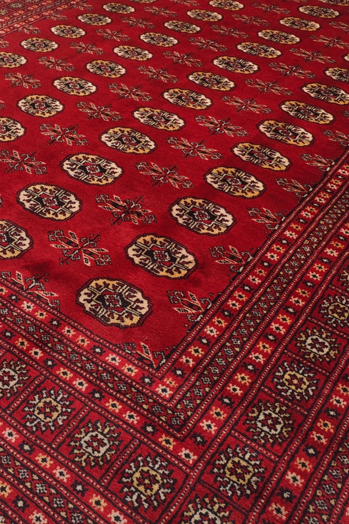 Madder Red and Wheat Gold Turkmen Gül Bokhara, Hand-Knotted Wool Rug