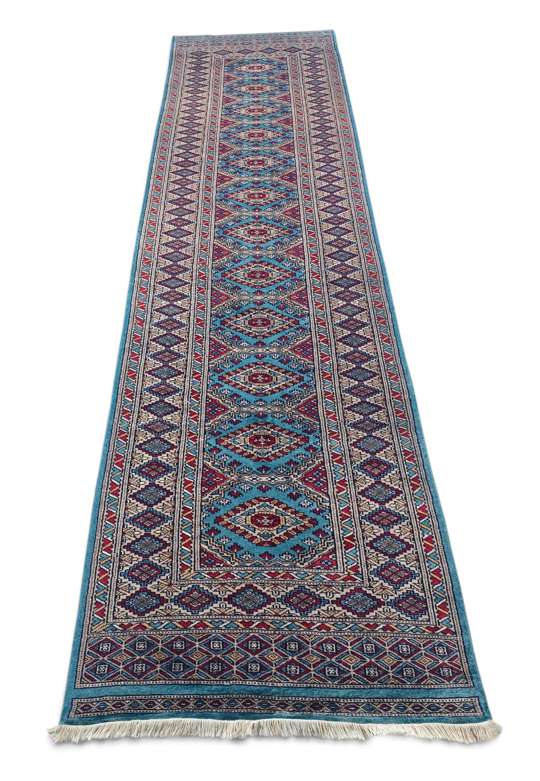 ターコイズのパキスタン絨毯 ジャルダール（幾何学柄）のボーダー（縁）のディテール